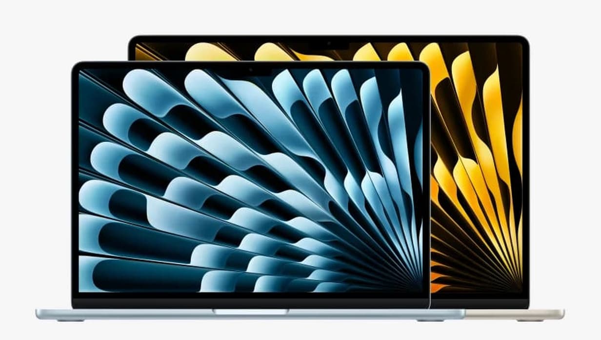 Two MacBook Air notebooks open, seen from the front